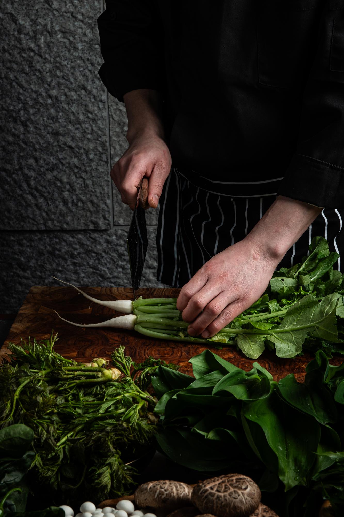 Workshop chef hands selecting herbs